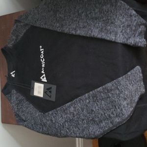 Apricoat women s/xs thermal top, fitted. Black with grey sleeves.